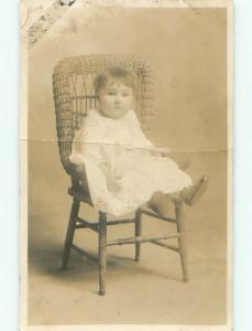 Bent Pre-1929 rppc ANTIQUE FURNITURE - BABY SITTING ON BABY CHAIR o2390