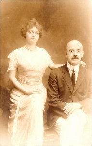 RPPC Couple Sitting, Bald Man Boardwalk Atlantic City NJ Real Photo Postcard