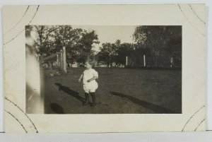 RPPC Cute Child Playing in Yard Real Photo Postcard O11