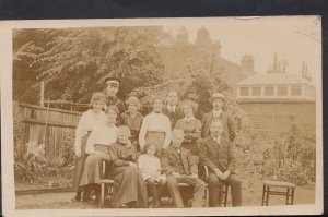 Ancestors Postcard - Group of People Posing, Young Man In Uniform RS3851