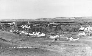 Havre Montana View~Houses-Unpaved Street-Water Tower~Bare Trees~Vintage RPPC