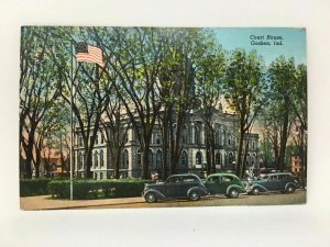 Early Goshen Indiana Court House Postcard Cars US Flag