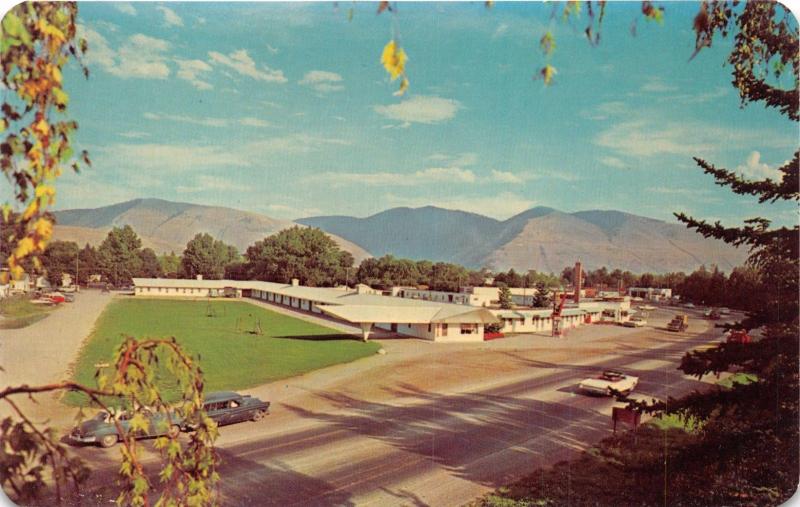 MISSOULA MONTANA~TRAVELERS TREAT MOTEL~WEST BROADWAY POSTCARD c1960s