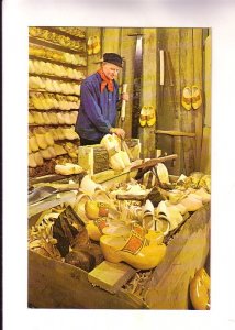 Man in Traditional Costume Making Wooden Shoes, Clogs, Netherlands