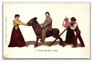 Comic Fat Man Riding Donkey Giving Baby a Ride UNP Embossed UDB Postcard R26
