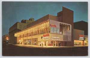 Gambling~Harrahs Casino & Restaurant At Night Reno Nevada~Vintage Postcard