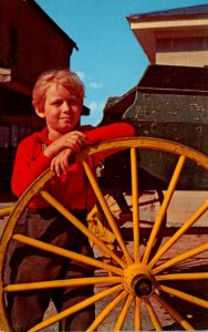 Greetings From The Amish Country Pennsylvania With Amish Boy Resting On Wheel...