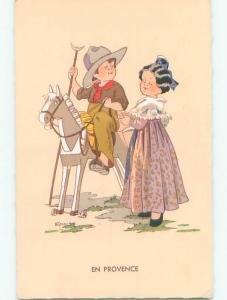 Pre-Chrome foreign signed CUTE GIRL WITH BOY AS COWBOY ON TOY HORSE k3563