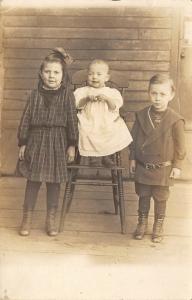 West Liberty Ohio 1910s RPPC Real Photo Postcard Three Children on Porch