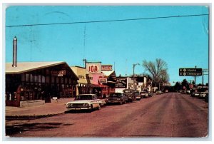 1969 Street Scene Classic Cars Road Buildings Atlanta Michigan Vintage Postcard