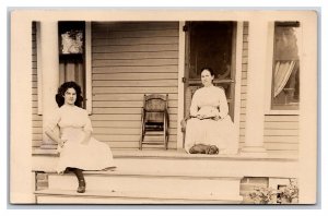 RPPC Two Pretty Women In White Sitting on Porch UNP Postcard S3