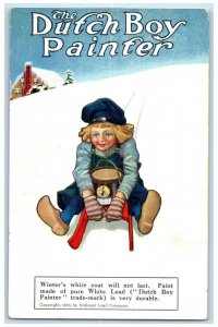 The Dutch Boy Painter Sledding House Winter Lead Paint Advertising Postcard