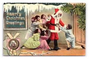 Hearty Christmas Greetings Red Robe Santa Surrounded By Children c1912 Postcard