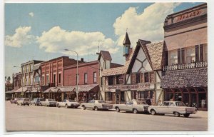 Street Scene Cars Alpine Village Gaylord Michigan postcard