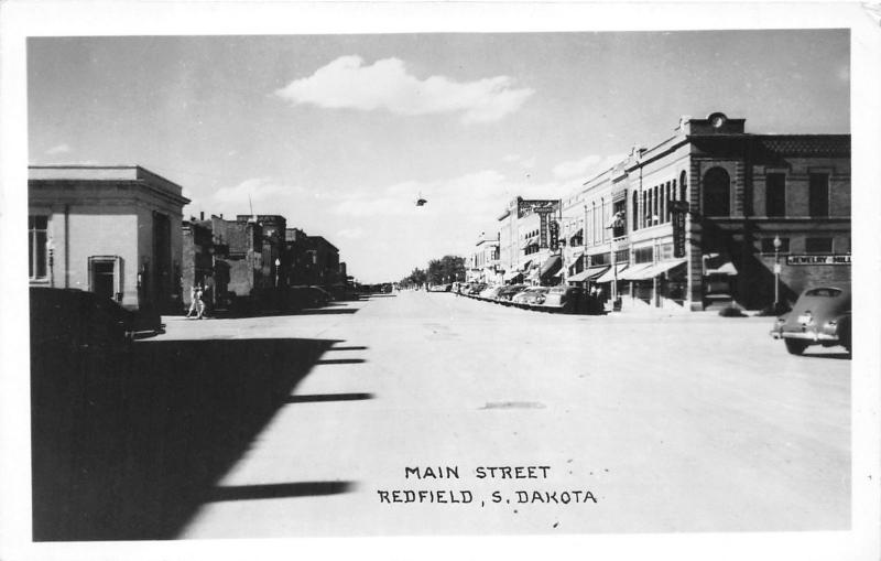 Redfield South Dakota~Downtown Main Street~Jewelry~Hardware~1950s RPPC