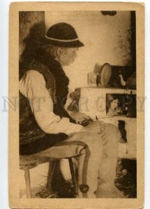 487872 Poland ZAKOPANE old man in national clothes at the stove Vintage postcard