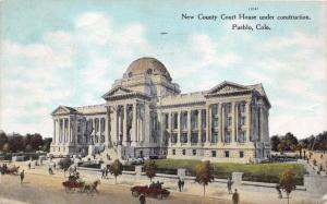 PUEBLO CO NEW COUNTY COURT HOUSE UNDER CONSTRUCTION~HYDE PAPER PUB POSTCARD 1909