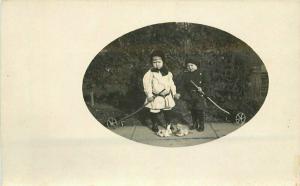 C-1910 Children Pull Toy Rabbits RPPC Photo Postcard 2579 Frame like 2579