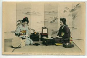 Japanese Woman & Maid at Supper Japan 1905c hand colored postcard