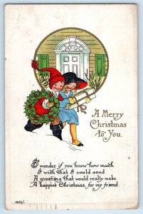 Christmas Postcard Children With Wreath Berries And Gift Embossed Springfield MA
