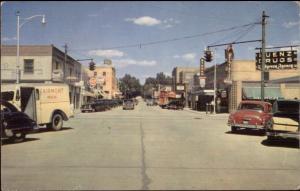 Ogallala NE Street Cars Fairmont Milk Truck Drugstore Postcard c1950