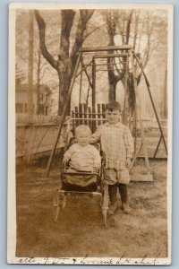 c1910's Little Boy And Baby On Stroller At The Park RPPC Photo Antique Postcard