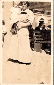 Real Photo Postcard Mother Holding Baby in the Sand in Long Beach, California