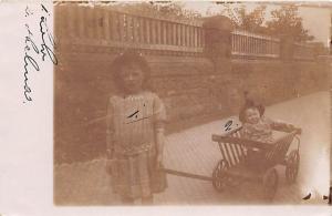 Pulling kid in wagon Child, People Photo Unused 