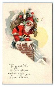 CHRISTMAS CHEER ~ SANTA W/ Sack Full of TOYS at CHIMNEY c1910s Gibson Postcard