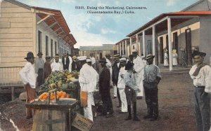 DOING THE MARKETING CAIMANERA GUANTANAMO BAY CUBA POSTCARD (c. 1910)
