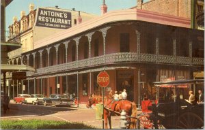 Postcard New Orleans - Bourbon Street -  Antoine's Restaurant old cars