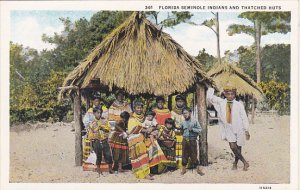 Seminole Indians and Thatched Huts In Florida