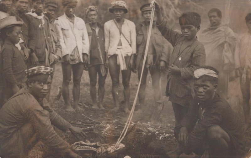 RPPC IGOROTES DOG INTESTINES PHILIPPINES ISLANDS REAL PHOTO POSTCARD (c.1910)