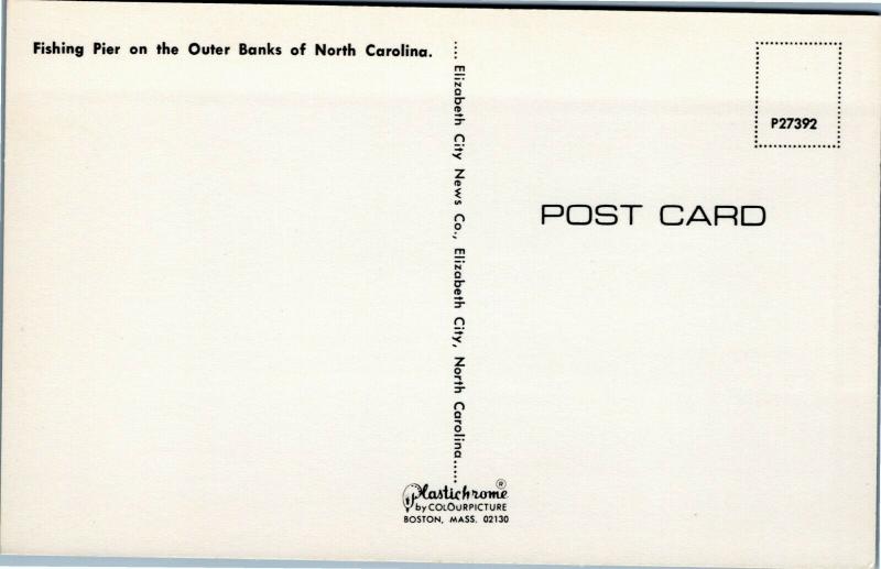 Fishing Pier on the Outer Banks - view from beach with waves rolling in