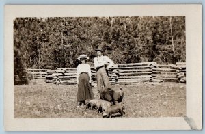 c1910's Man Woman Animal Farm Feeding Hog Piglets RPPC Photo Antique Postcard