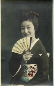 japan, Beautiful Smiling Geisha Girl with Fan (1910s) Hand Painted RPPC Postcard