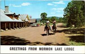 Postcard AZ Greetings from Mormon Lake Lodge Horsemen Gas Station 1960s S112