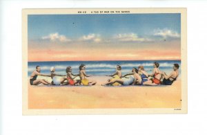 Swimming/Bathing - Tug o' war on the sands…