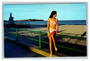 Vintage 1980's Postcard Bikini Girl On the Fence at Hampton Beach New Hampshire