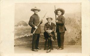 Studio Shot 3 Men In Military Uniforms. Two Holding Rifles Real PhotoPostcard