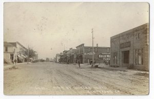 Ca. 1915 Armstrong Iowa Street Town Scene Gold Medal Flour John Deere Signs RPPC