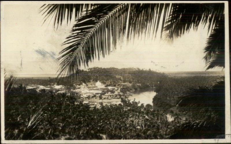 Philippines Village in Distance c1930 Real Photo Postcard - Used