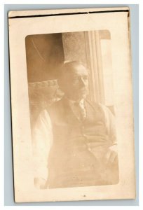 Vintage 1900's RPPC Postcard Grandfather Sitting in Window Last Name on Back