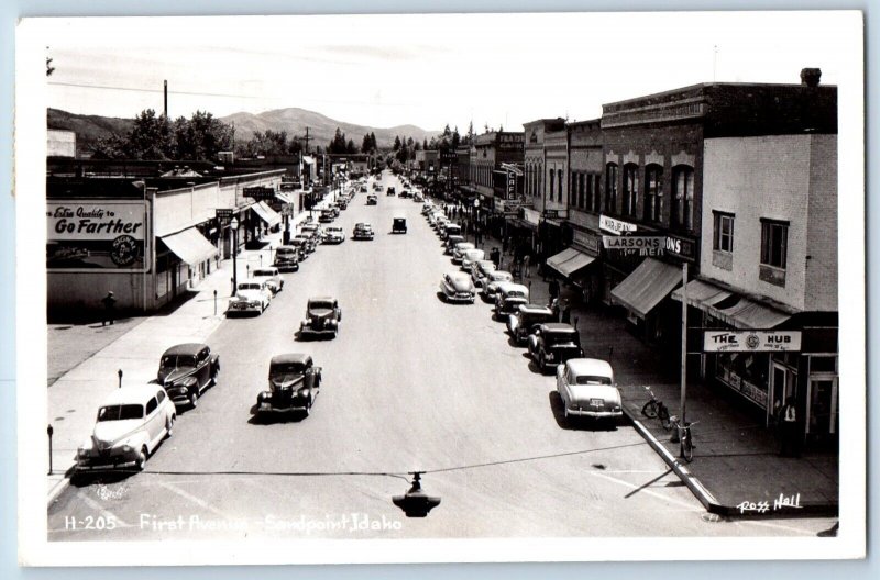 Sandpoint Idaho ID Postcard RPPC Photo First Avenue Larsons Cafe Cars 1952