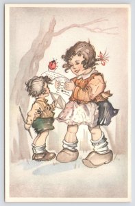 Greetings~Little Dutch Children In Forest~Girl Reads Paper To Boy~Ladybug~Vtg PC