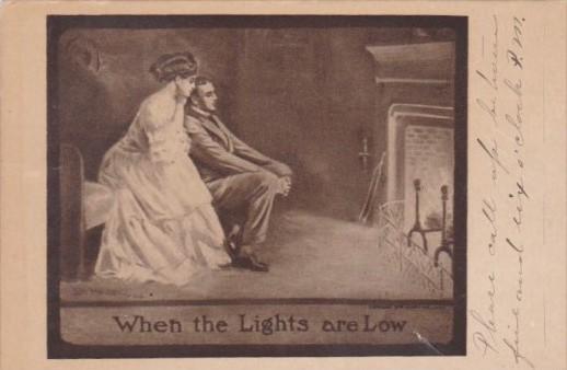 Romantic Couple Sitting By Fireplace When The Light Are Low 1910