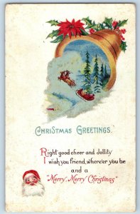 1920 Christmas Greetings Bell Santa Claus Sleigh Holly Berries Embossed Postcard