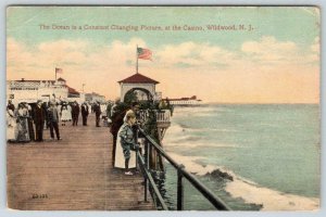 1914 WILDWOOD NJ*CASINO*THE OCEAN IS A CONSTANT CHANGING PICTURE* POSTCARD*FLAG