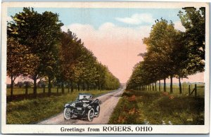 postcard Greetings from Rogers, Ohio - Antique car driving down country lane