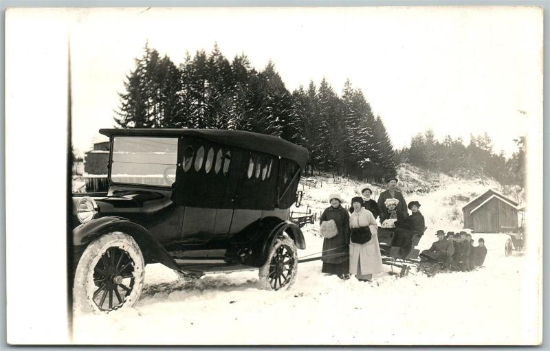 AUTOMOBILE PULLING THE SLEDS in SNOW ANTIQUE REAL PHOTO POSTCARD RPPC